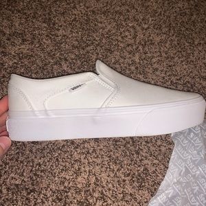 Vans slip on platforms. Brand new never worn.